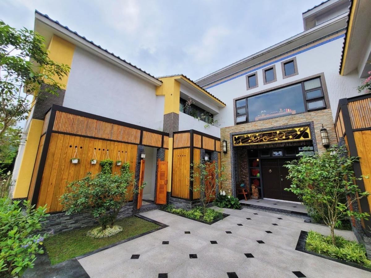 Apartmán 山花映水紅莊園民宿 Yuemei Exteriér fotografie