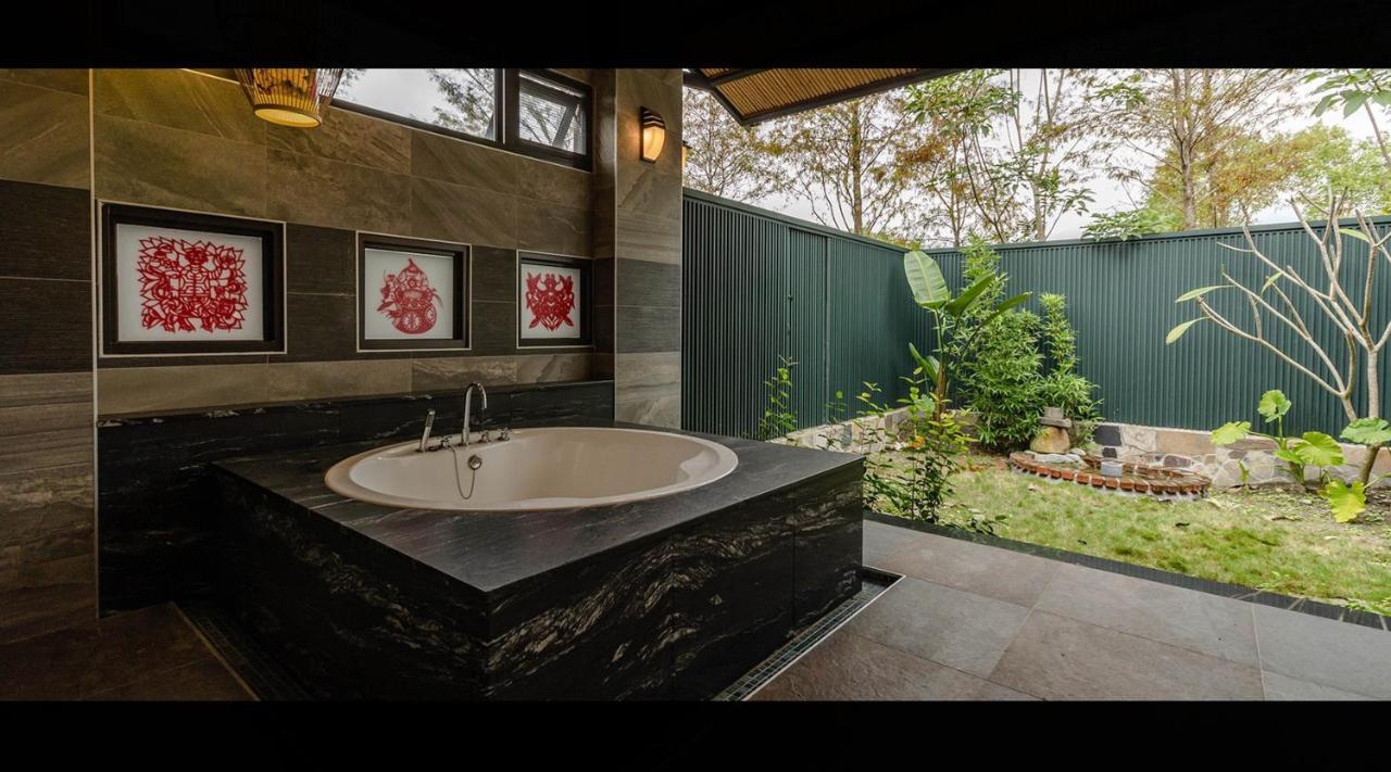 Apartmán 山花映水紅莊園民宿 Yuemei Exteriér fotografie